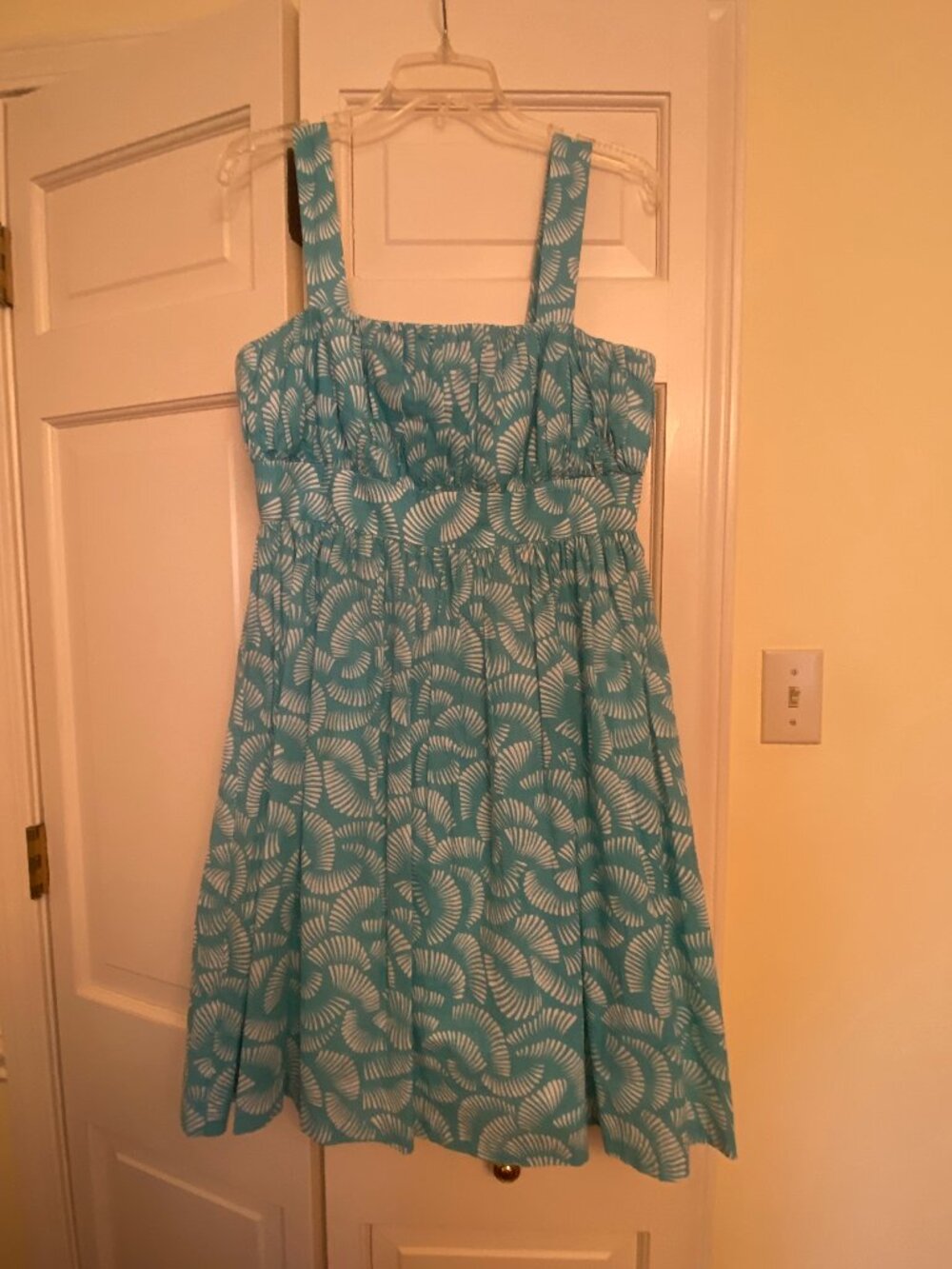 Turquoise & white empire waist sleeveless knee-length zip-up dress with lining